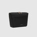 Black pouch with gold zipper on a light gray background