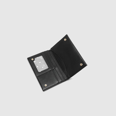 Black leather wallet on a light gray background