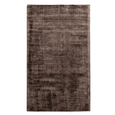 Rectangular brown rug on a white background
